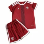 Catar Niños Conjunto 2026 Casa Rojo - Catar Niños Barata | 7camisetas